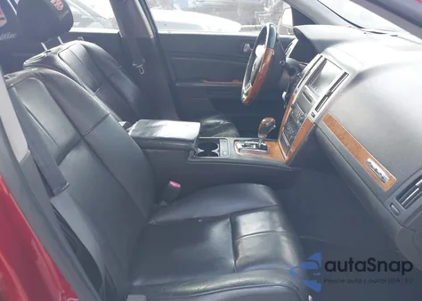 2010 Cadillac Sts Premium Package z USA, uszkodzony, nr VIN 1G6DU6EVXA0106117